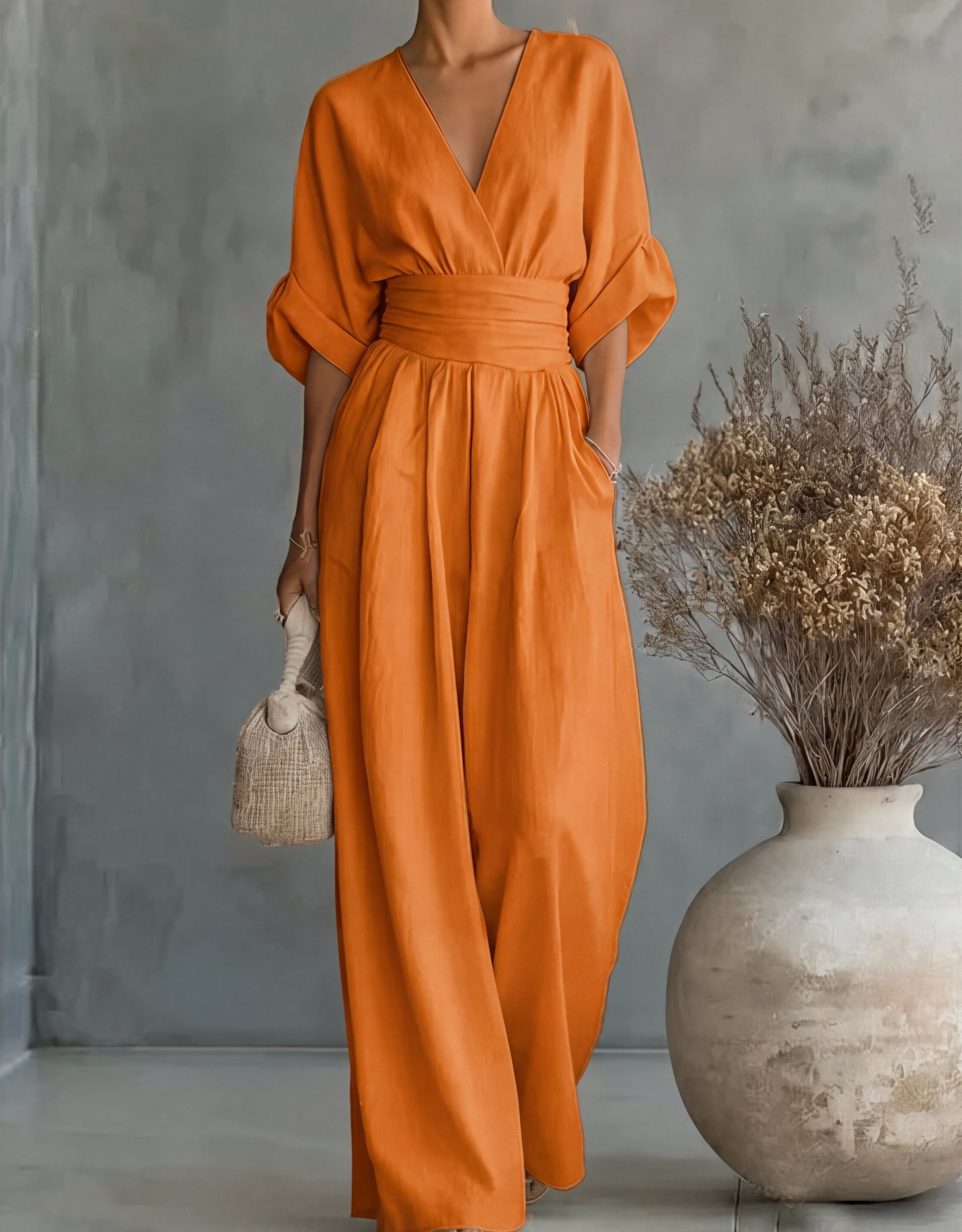 Daniela – Tuta elegante con scollo a V e pantaloni a gamba larga